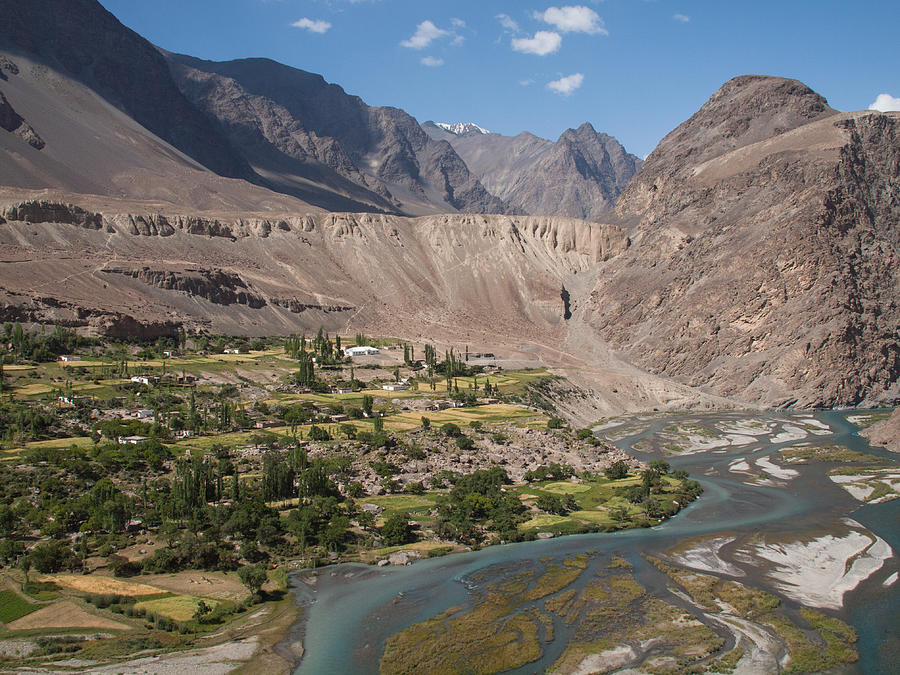 Barchadiv (aka Barchadiev) village on the bank of Murghab river in Bartang valley in the Pamirs, Tajikistan Photograph by Evgenii Zotov