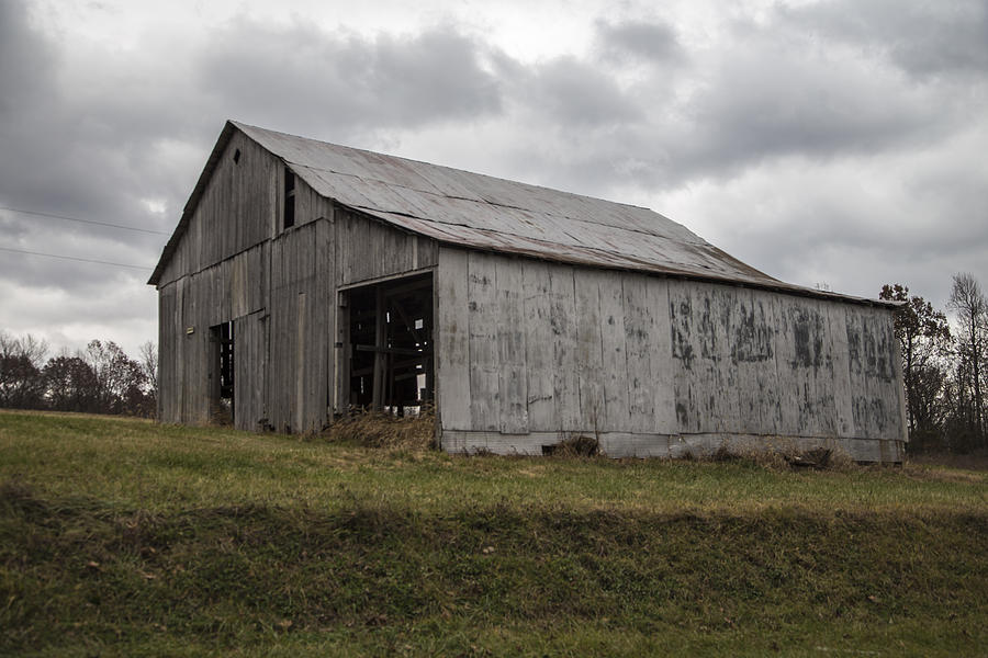 Barn on a Hill Photograph by John McGraw