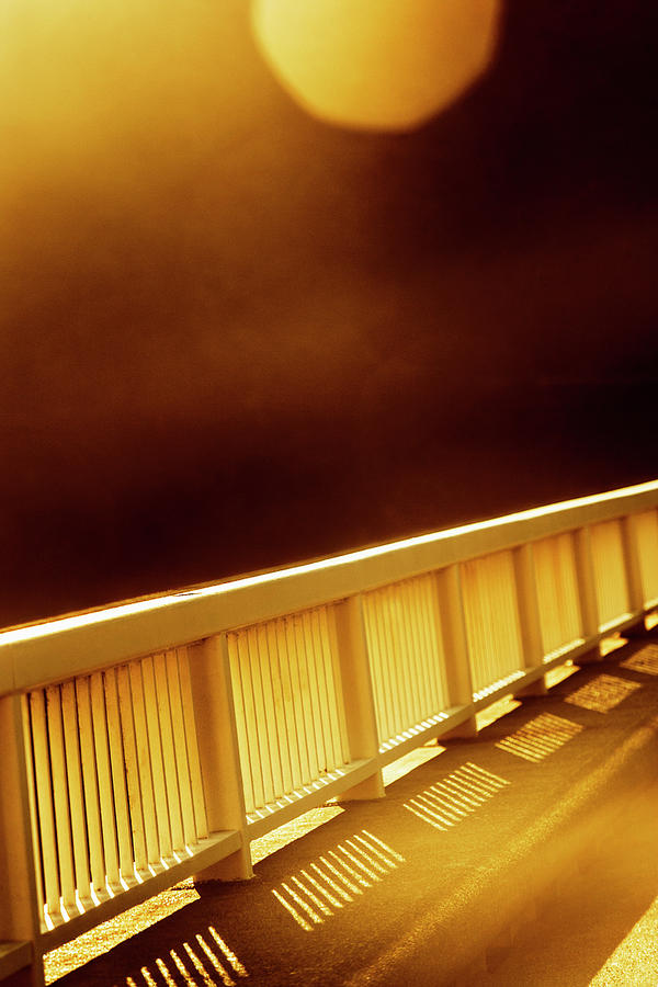 Bridge Photograph - Barrier With Motion Blur And Lens Flare by Ron Koeberer