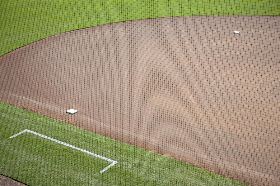 Baseball diamond, cropped Photograph by PhotoAlto/Sandro Di Carlo Darsa