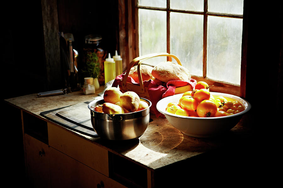 Basket Of Bread Pears And Tomatoes On Photograph by Thomas Barwick