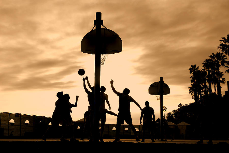Basketball Photograph - Basketball players at sunset by Joe Belanger