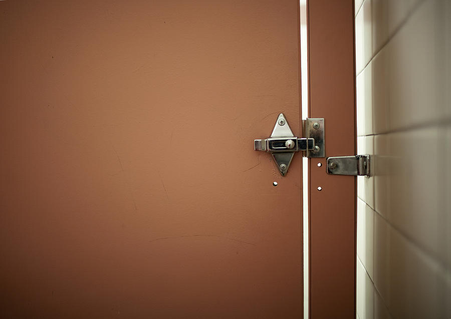 Bathroom stall door and lock Photograph by Sarah Palmer