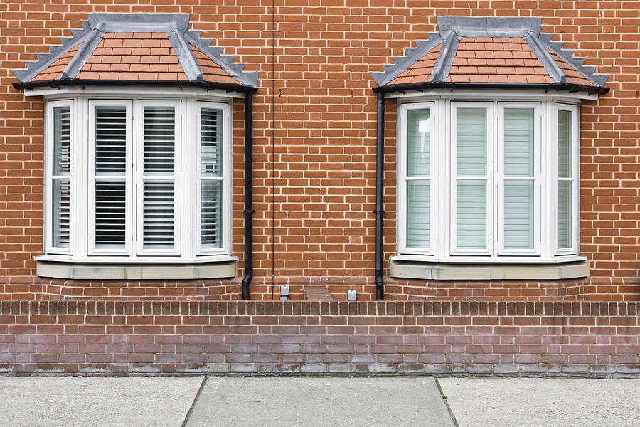 Brick Photograph - Bay windows by Tom Gowanlock