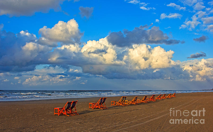 Beach And Chairs With Cloudy Sky Photograph