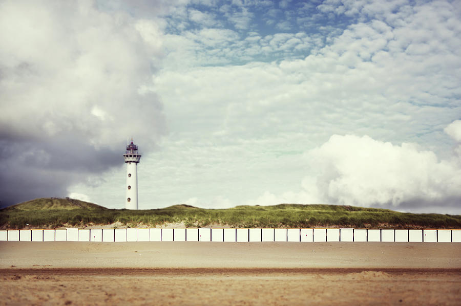 Beach, Beach Huts, Lighthouse And Dunes Photograph by Elisabeth Schmitt