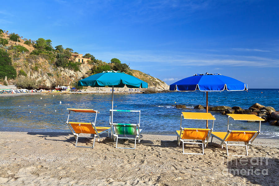 Beach Chairs And Umbrellas Photograph by Antonio Scarpi