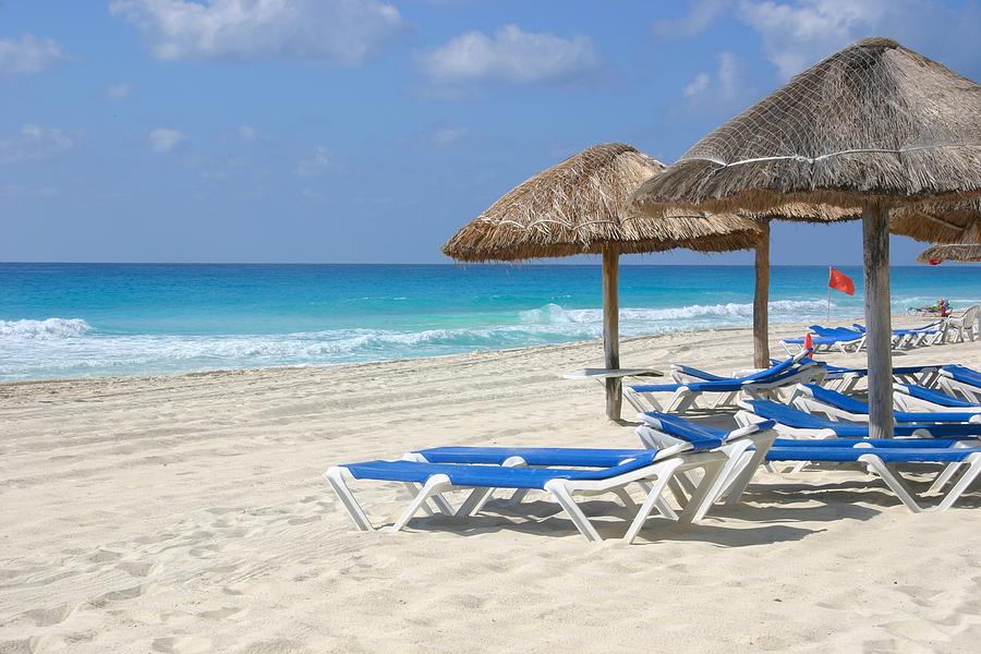 Beach chairs in Cancun Photograph by Jane Girardot