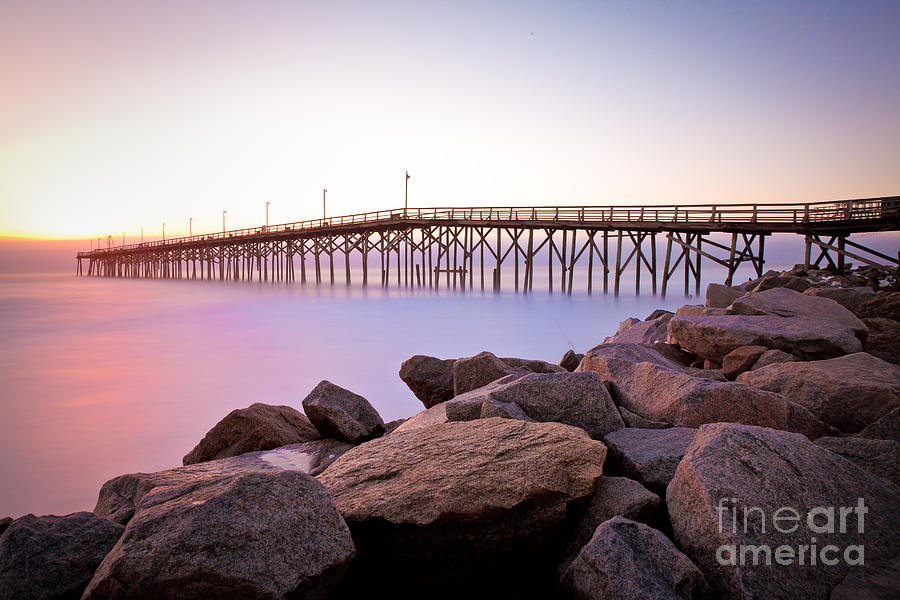 Beach Fishing Pier and Rocks at Sunrise Photograph by Jo Ann Tomaselli