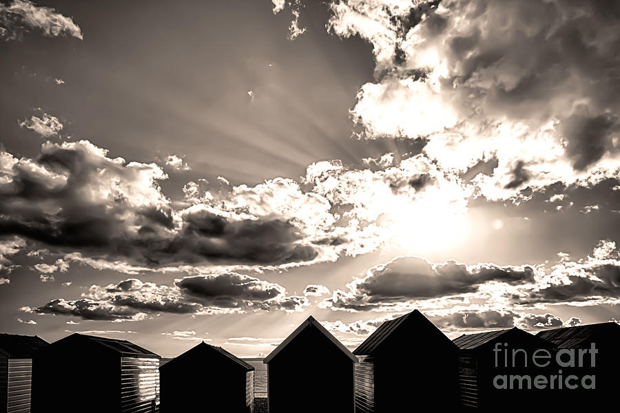 Beach huts in black and white Photograph by Simon Bratt