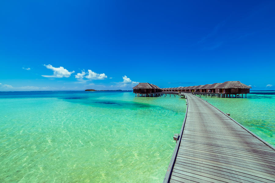 Beach in Maldives and blue lagoon Photograph by Levente Bodo