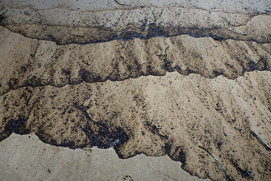 Beach Oil Seepage Photograph by Roger Mullenhour