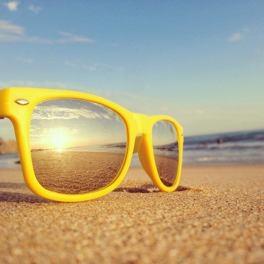 Beach reflection in sunglasses Photograph by Noelbesuzzi
