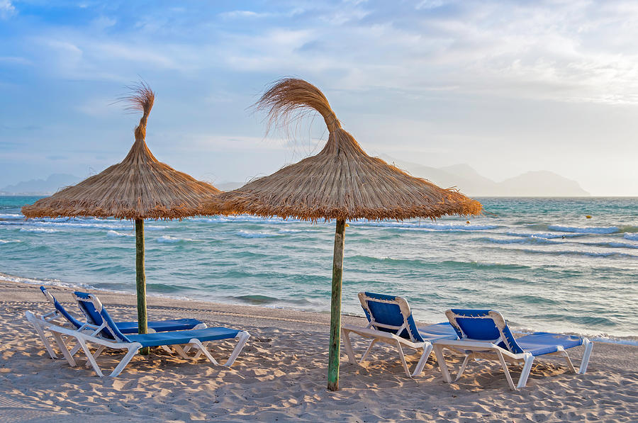 Beach Scene With 4 Blue Chairs And 2 Photograph by Martin Wahlborg