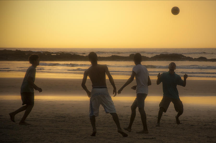 Beach Soccer At Sunset Photograph by Owen Weber