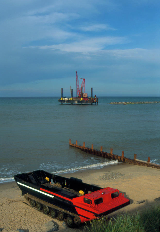 Beach With Sea Defences Being Built Off-shore Photograph by Graeme Ewens/science Photo Library