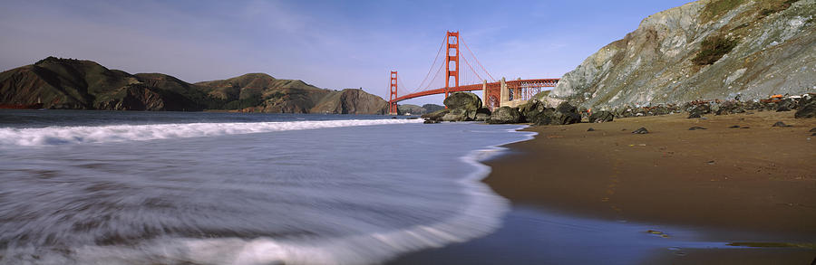 Beach With Suspension Bridge Photograph by Panoramic Images