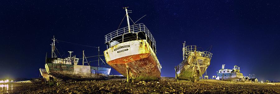 Beached Wrecks At Night Photograph by Laurent Laveder
