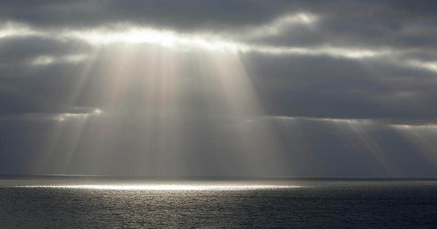 Beams Of Sunlight Over Water Photograph by Travelpix Ltd