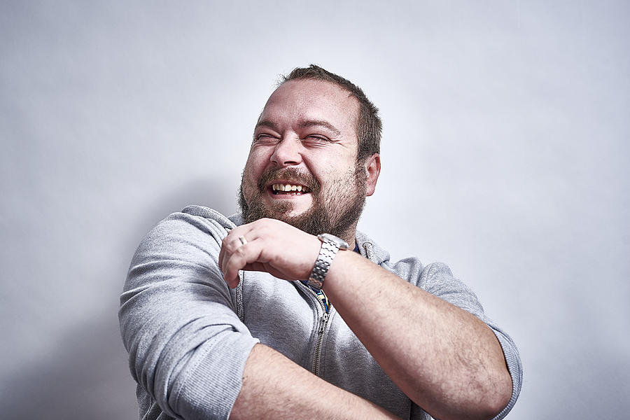 Bearded British male laughing hysterically Photograph by Jamie Garbutt