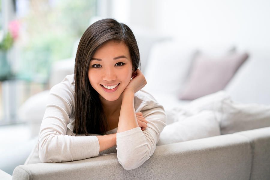 Beautiful Asian woman at home Photograph by Andresr