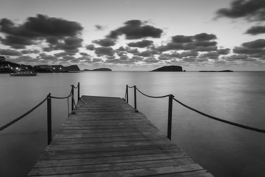 Beautiful black and white Ibiza coastal sunrise landscape Photograph by