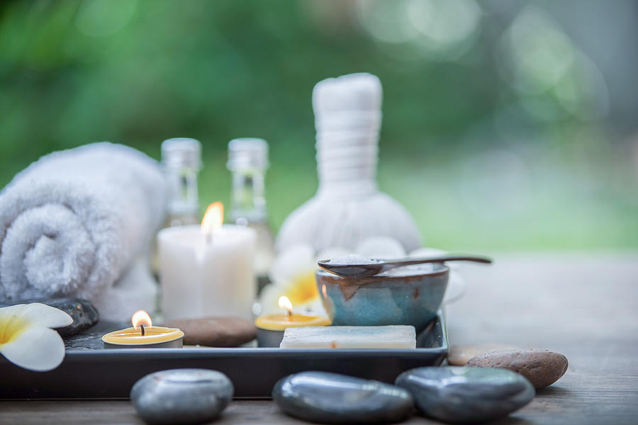 Beautiful composition of spa treatment on wooden table Photograph by Boonchai Wedmakawand