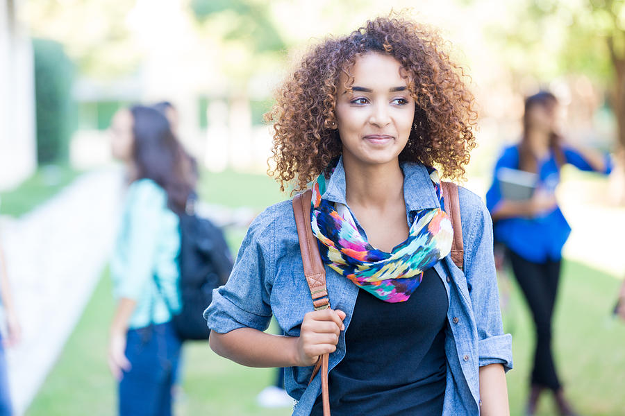 Beautiful curly haired African American college or high school student Photograph by Steve Debenport