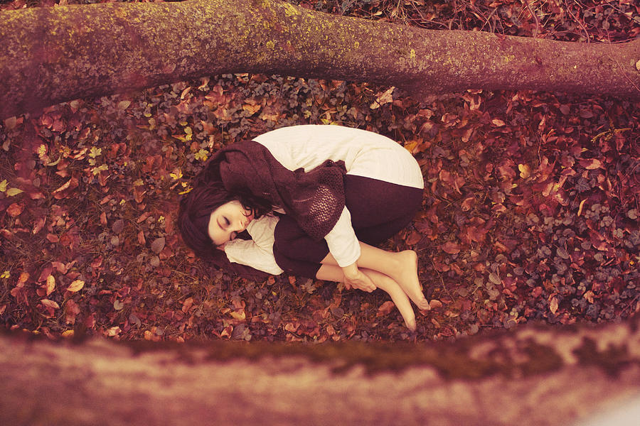 Beautiful girl dreaming in a autumnal wood Photograph by I always saw better when my eyes were closed