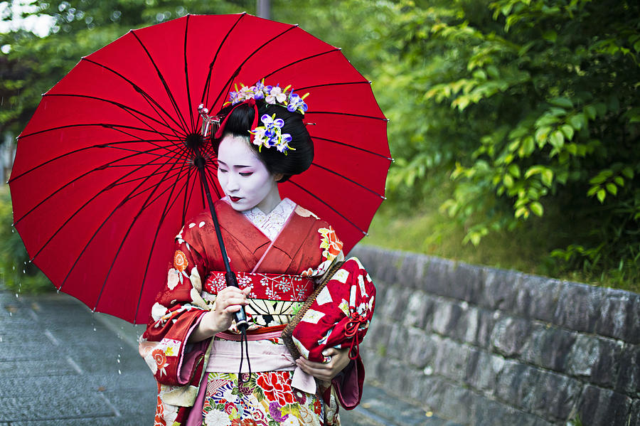Beautiful Maiko in the streets of Kyoto Photograph by Xavierarnau