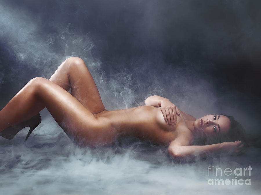 Beautiful nude woman lying in clouds of smoke Photograph by Maxim Images Exquisite Prints