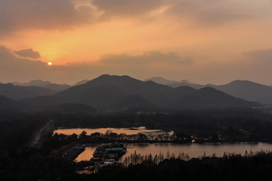 Beautiful Sunset At Hangzhou West Lake Photograph by Maria Swärd