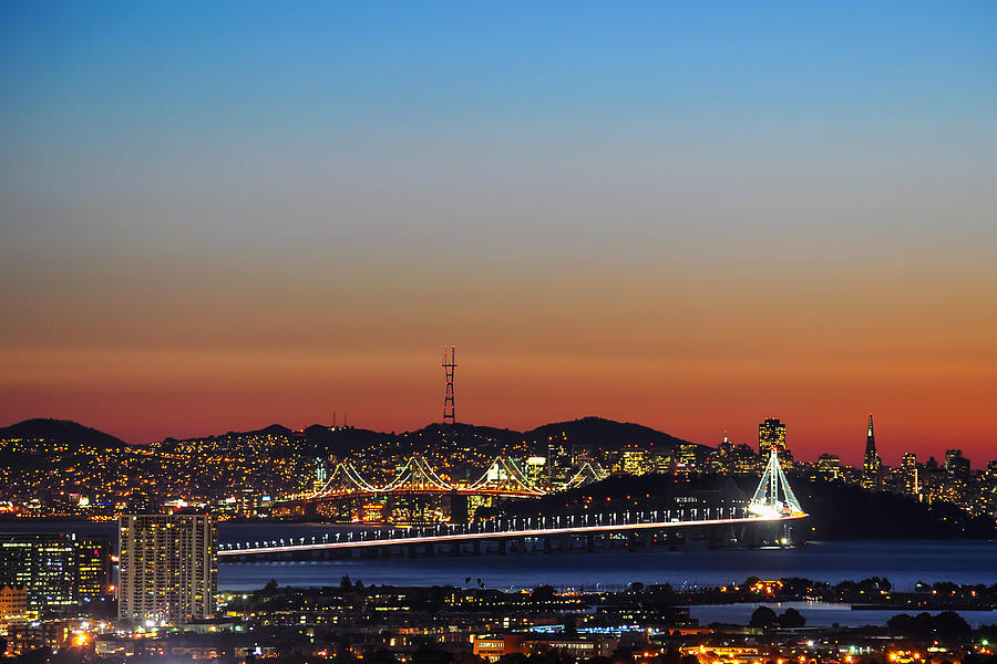 Beautiful Sunset over the New Bay Bridge and San Francisco Photograph by Joel Thai