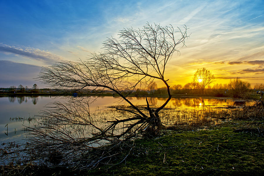 Nature Photograph - Beautiful sunset reflecting in a lake by Jaroslaw Grudzinski