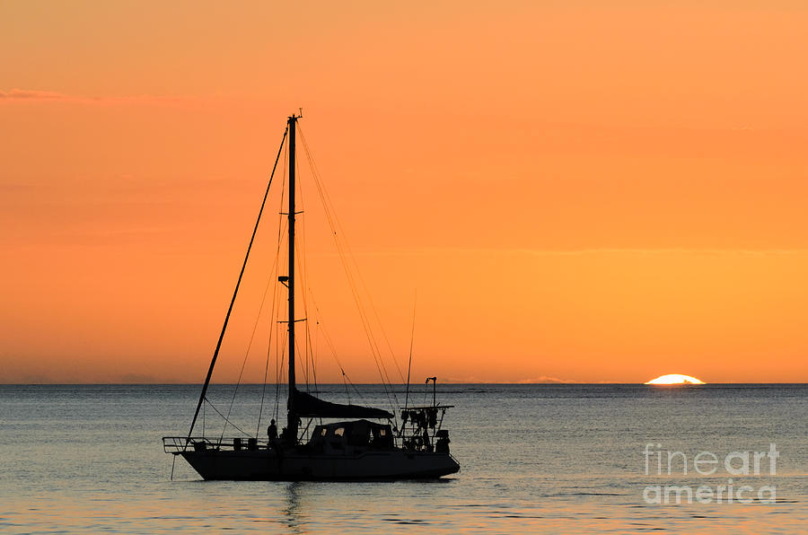 Sunset Photograph - Beautiful tropical sunset over the ocean with yacht by David Hill