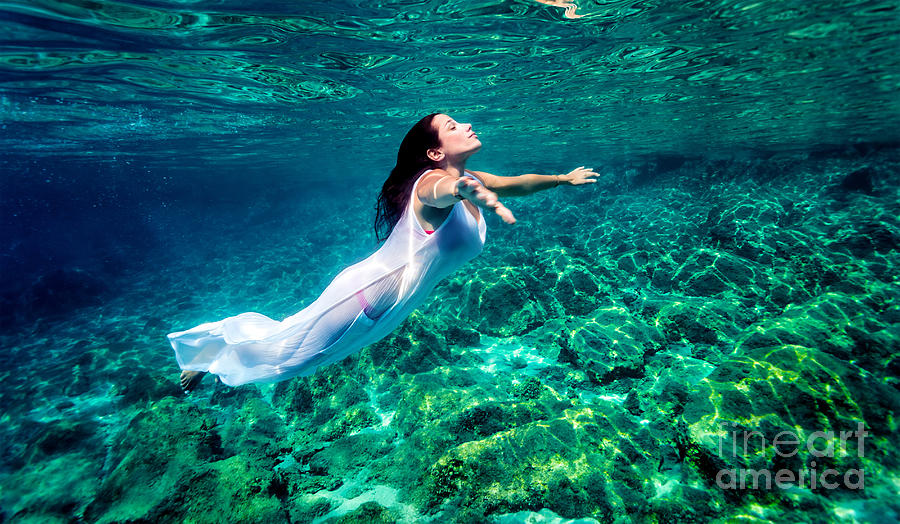 Beautiful woman relaxing in the water Photograph by Anna Om