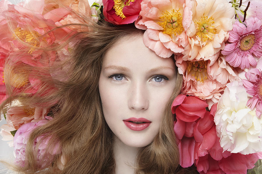 Beautiful Woman With Long Wavy Hair Between Flowers Photograph by Ada Summer