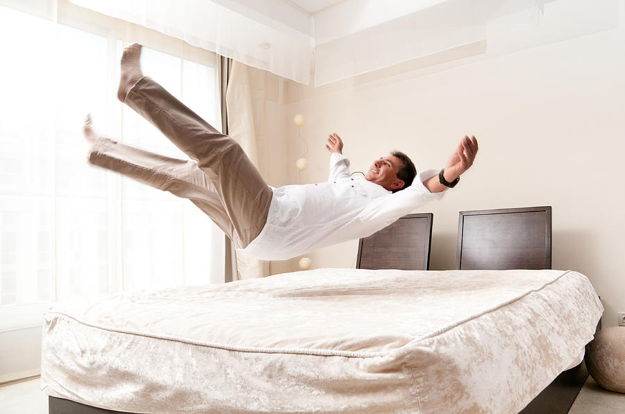 Bed Jump Photograph by Ferrantraite