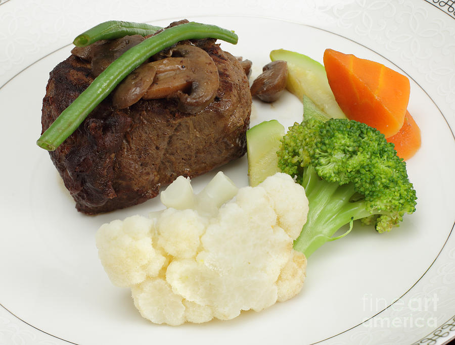 Beef tournedos with veg Photograph by Paul Cowan