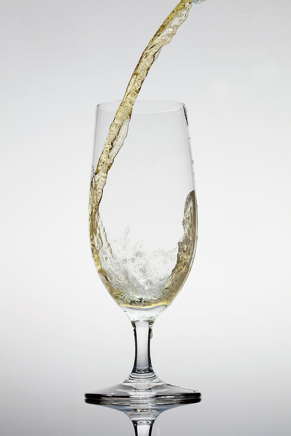 Beer Being Poured Into A Glass Photograph by Dual Dual Beer Being Poured Into A Glass Photograph by Dual Dual