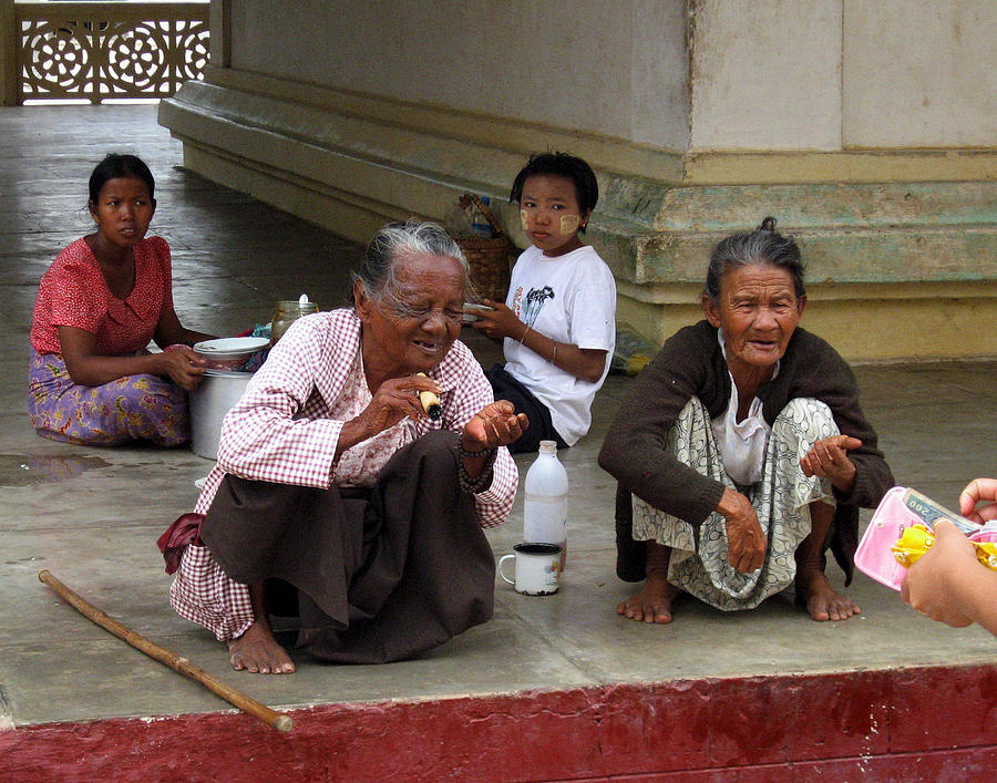Begging for money in the Shwezigon Pagoda Photograph by RicardMN Photography