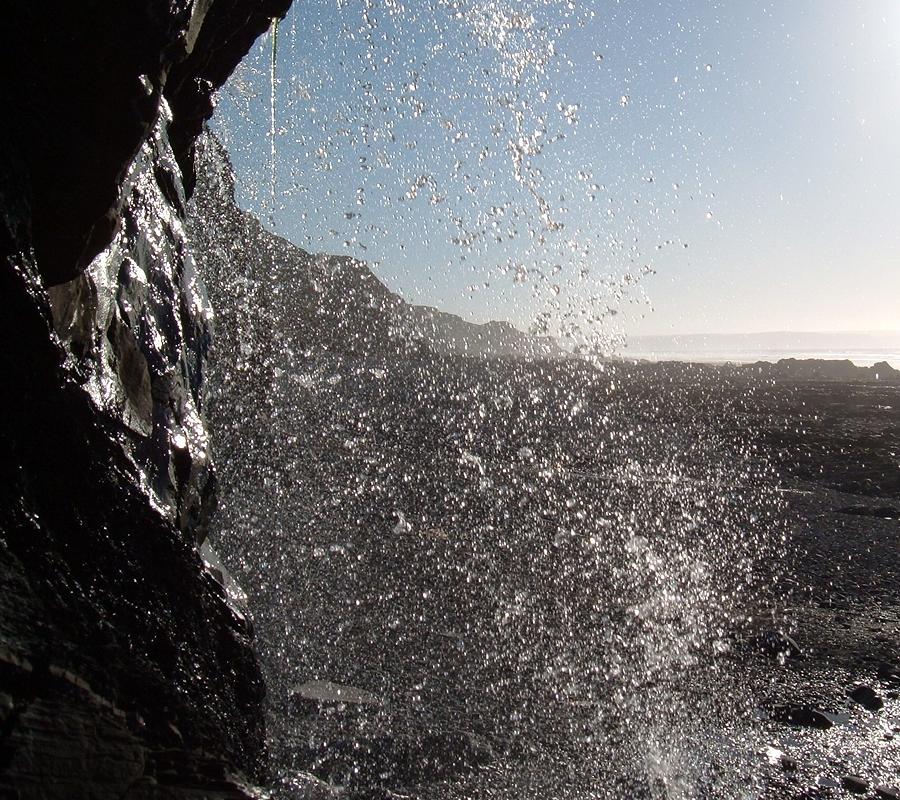 Behind The Waterfall Photograph