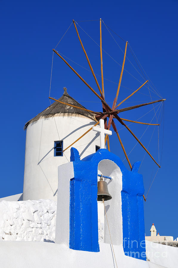 Belfry and windmill in Oia town Photograph by George Atsametakis