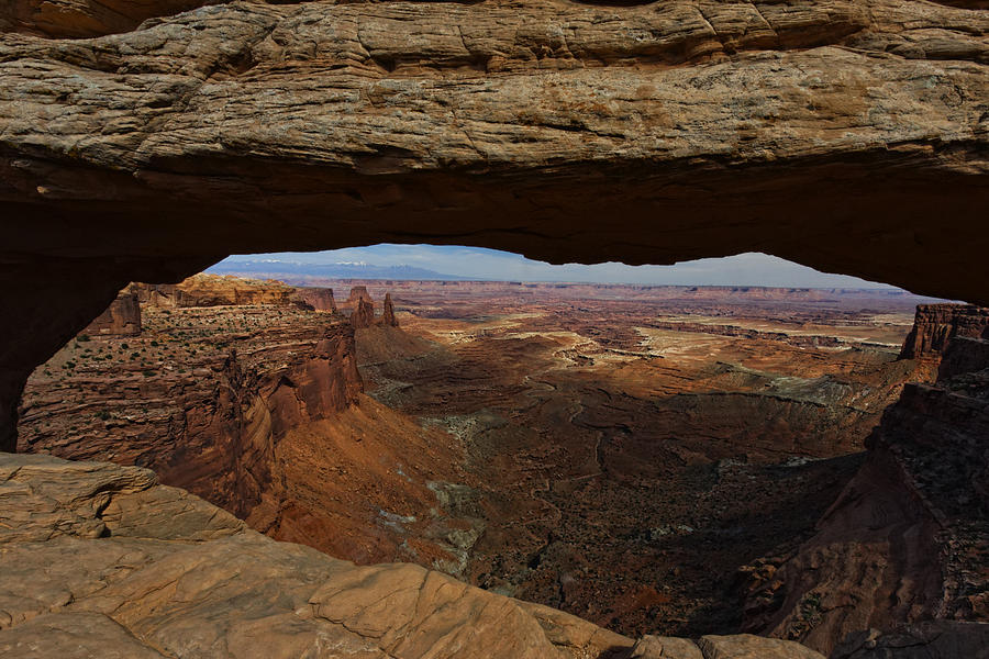 Below the Mesa Arch Photograph by Jonathan Davison