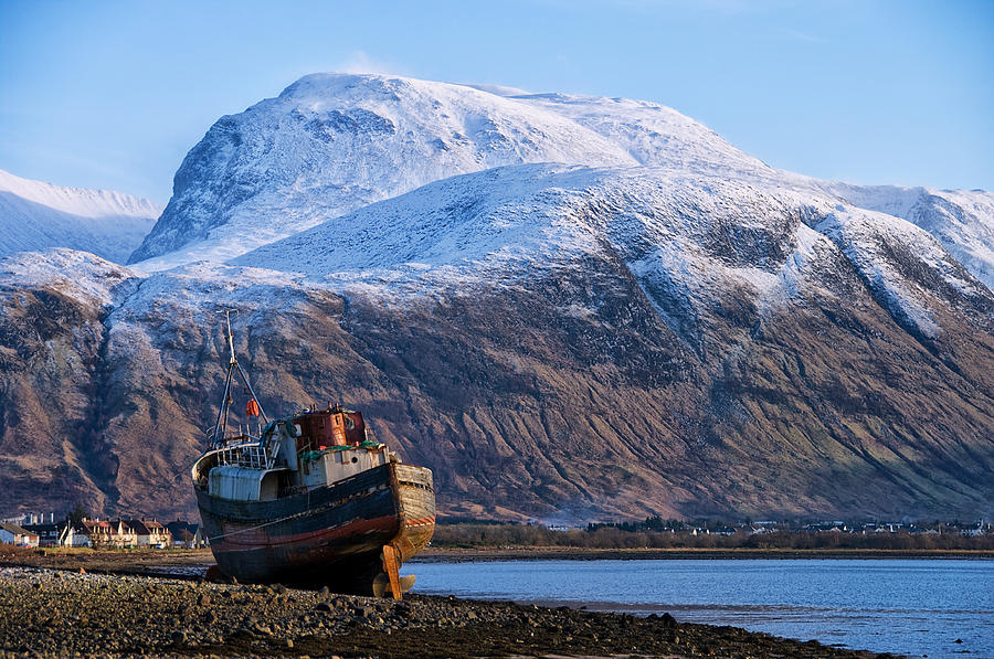 Winter Photograph - Ben Nevis and Old Boat by Jacqi Elmslie