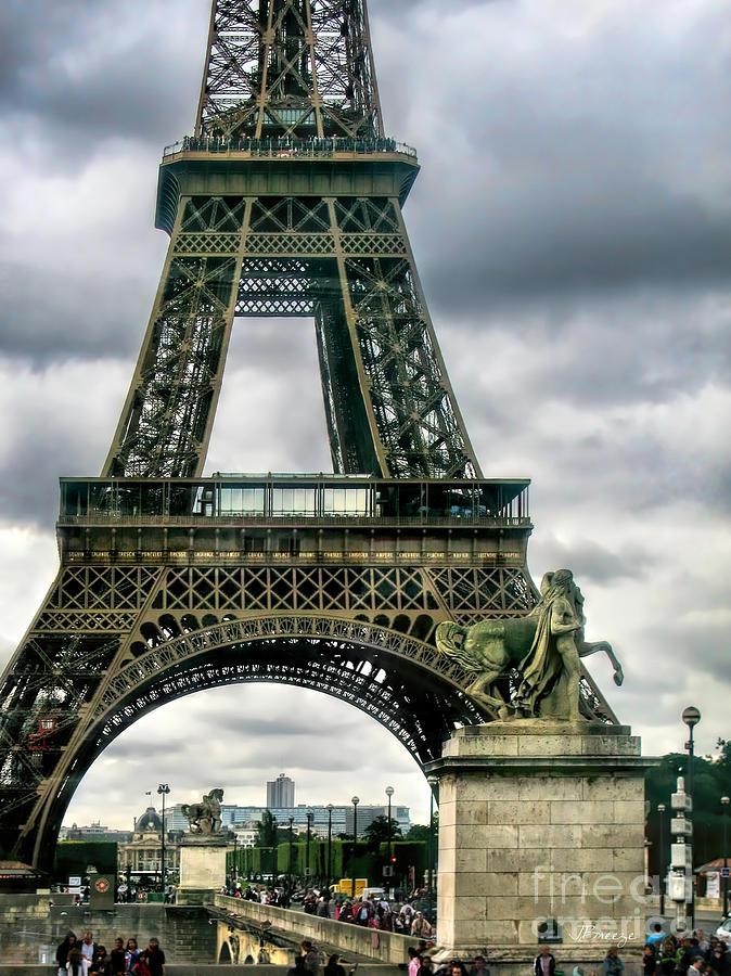 Beneath the Eiffel Tower Photograph by Jennie Breeze