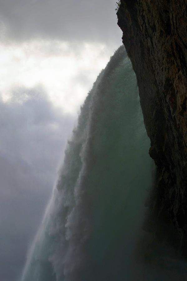 Beneath the Falls Photograph by Nadalyn Larsen