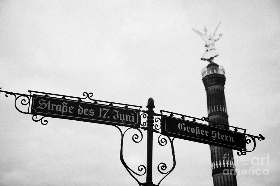 Berlin Photograph - Berlin Victory Column Siegessule behind roadsigns for Strasse des 17 Juni and Grosser Stern Berlin Germany by Joe Fox