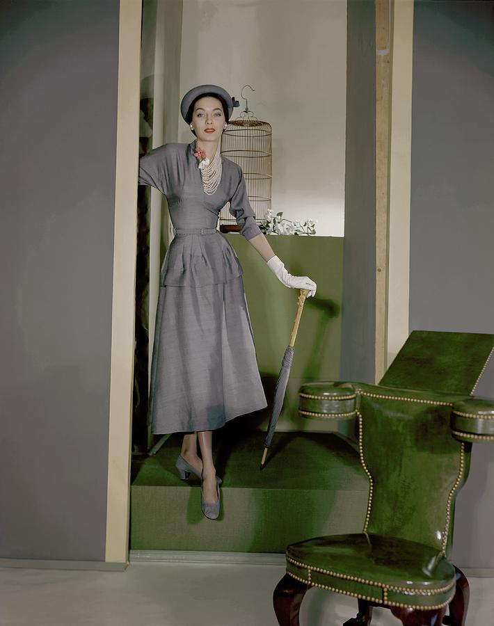 Betty Pulcer Threat Wearing A Grey Suit Photograph by Horst P. Horst