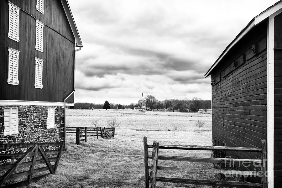 Between the Barn Photograph by John Rizzuto